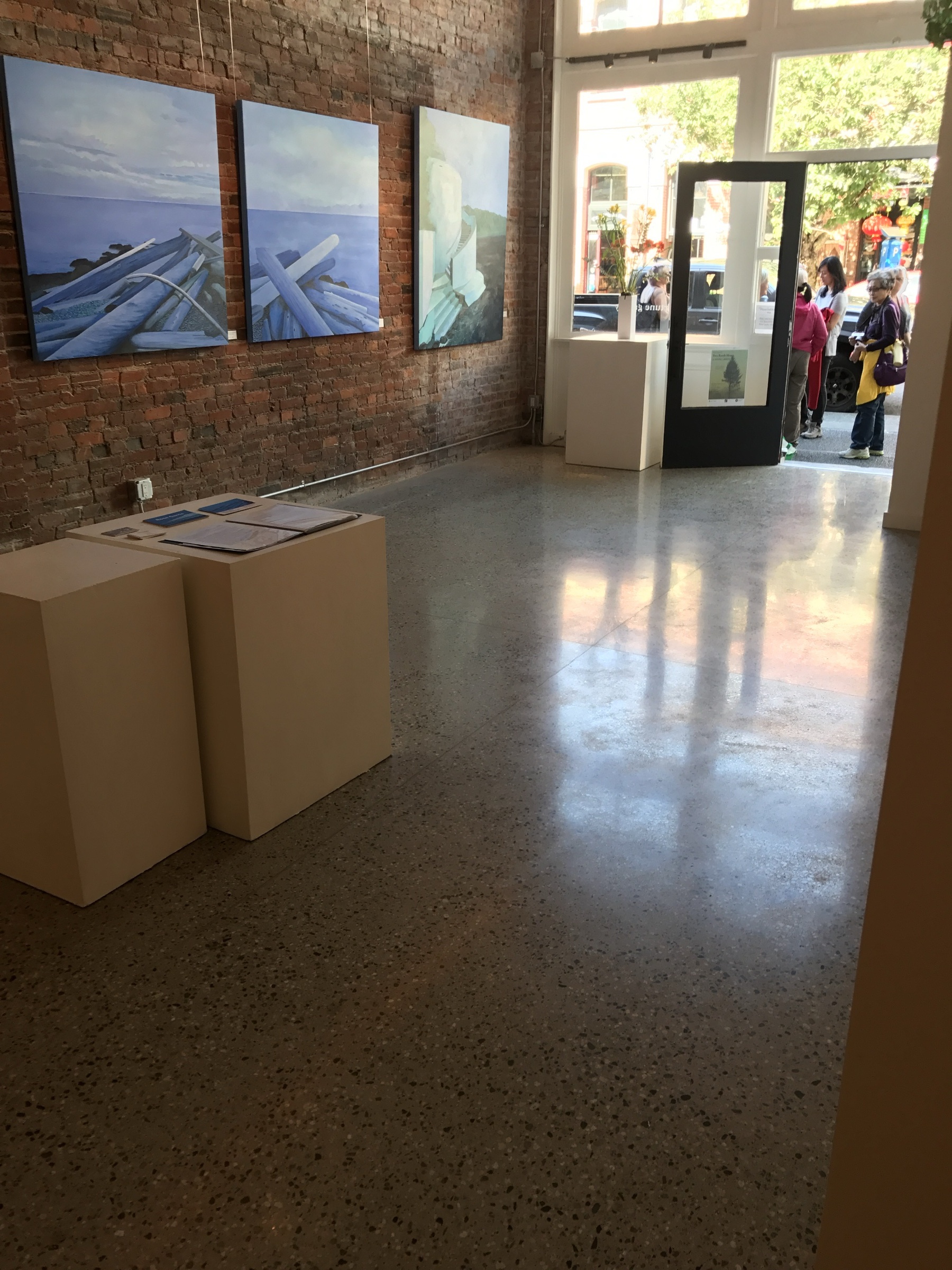 Miscellaneous commercial gallery interior with polished concrete floor.
