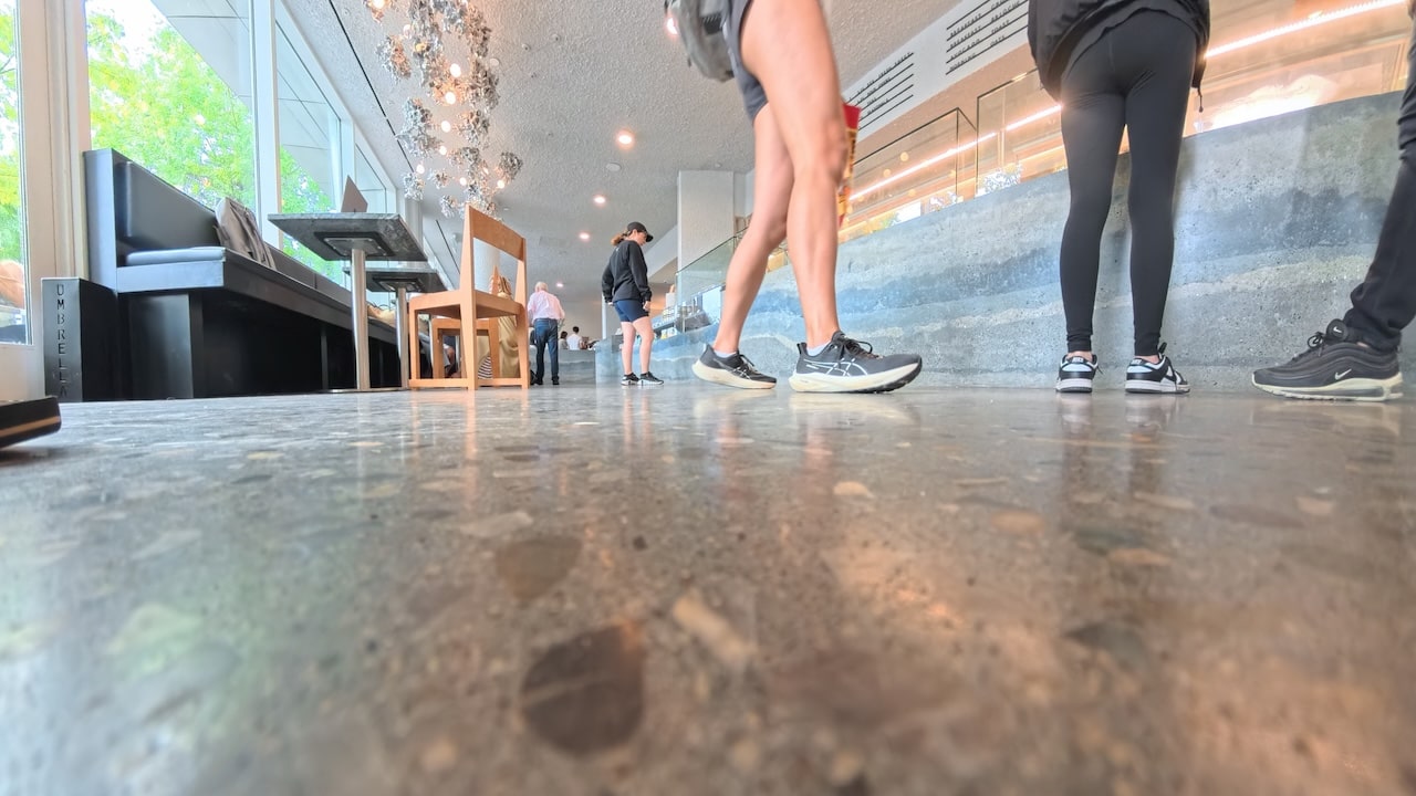 Victory Bakery polished concrete floor with customers walking through the space.